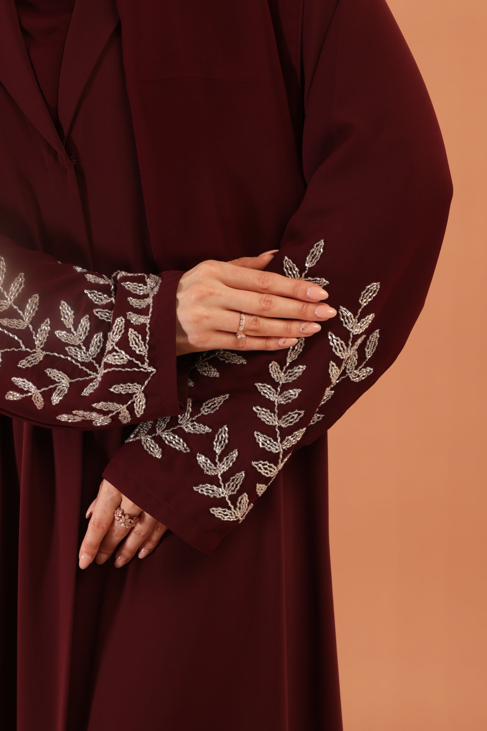 Annabi Luxe abaya — gold leaf embroidery sleeve detail